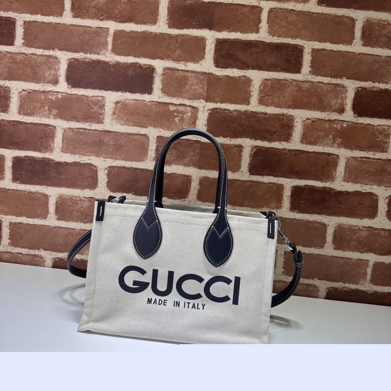 G*u*i top handle bags